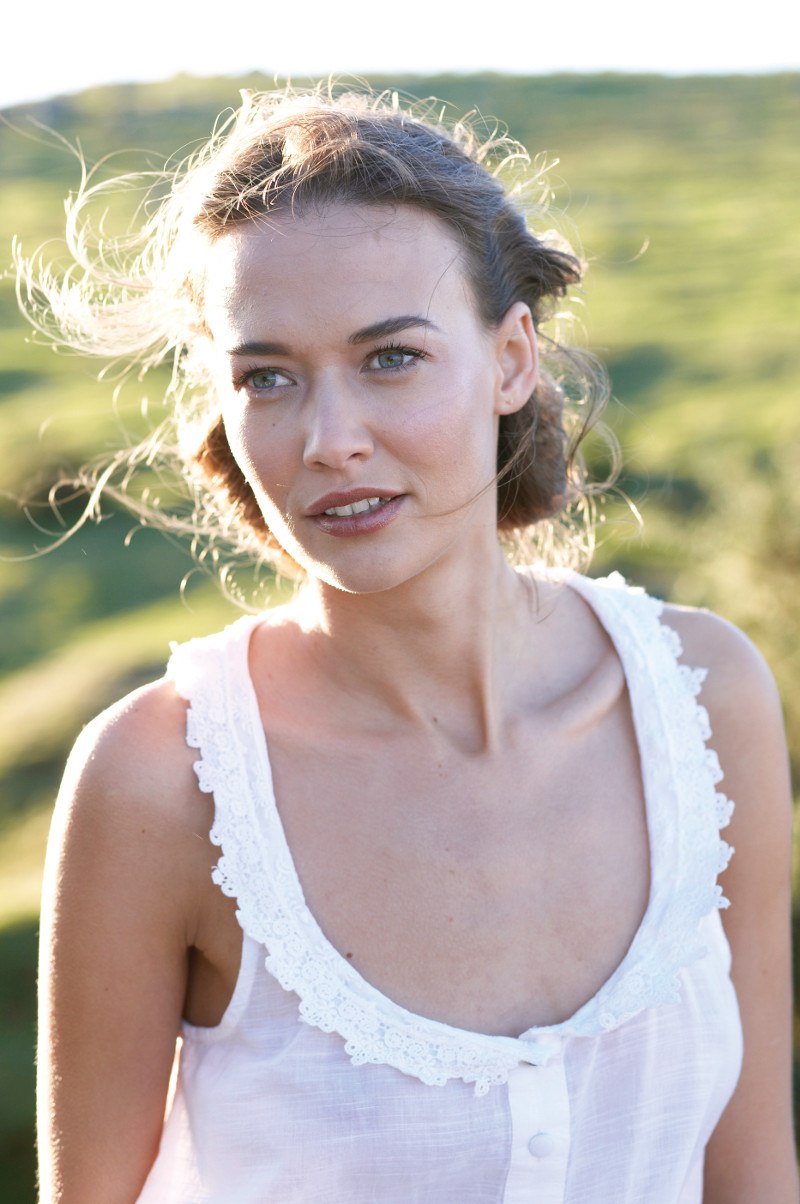 žena