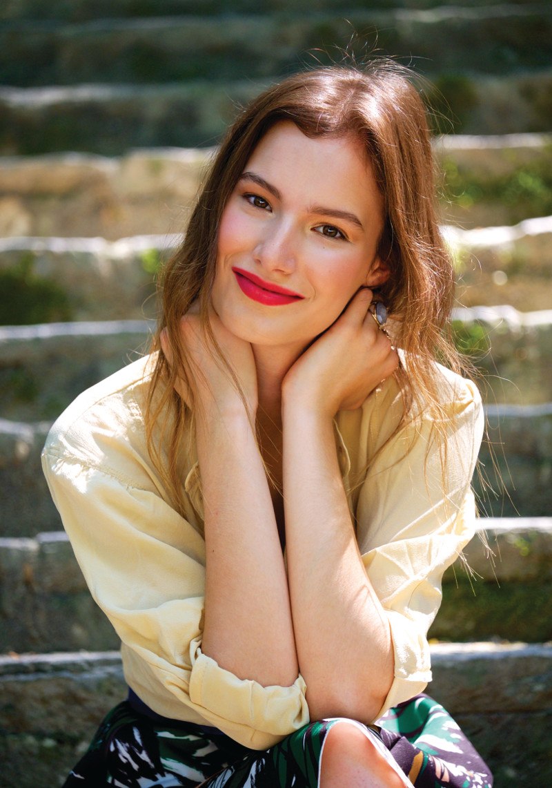 žena